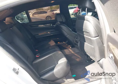 2014 BMW Alpina B7 из США, поврежденный, VIN WBAYE8C52ED135312